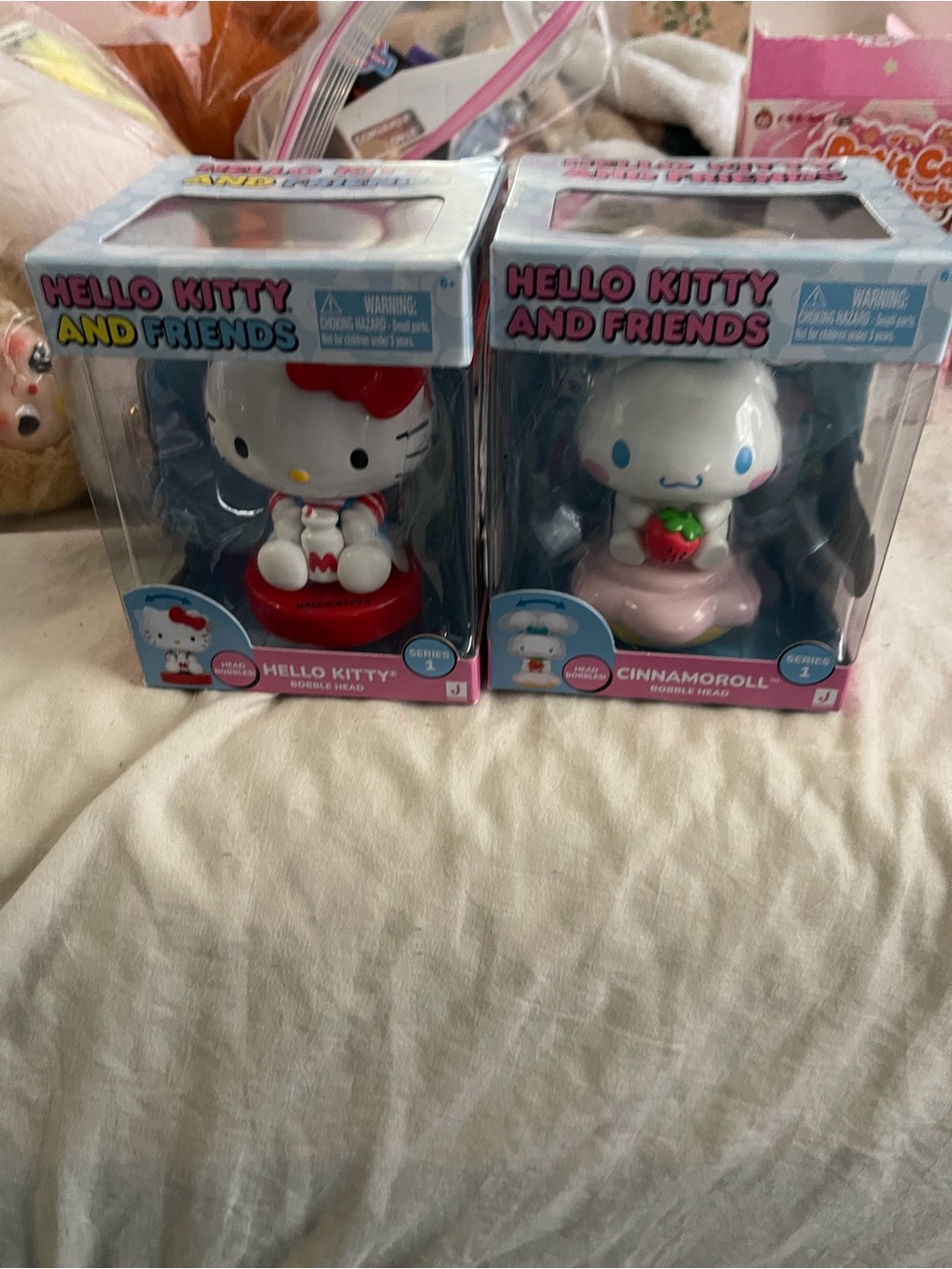 Hello Kitty Pink & Red Bobble Head Collectible Set - Hello Kitty and Cinnamoroll